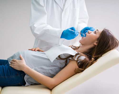 Лечение зубов при беременности